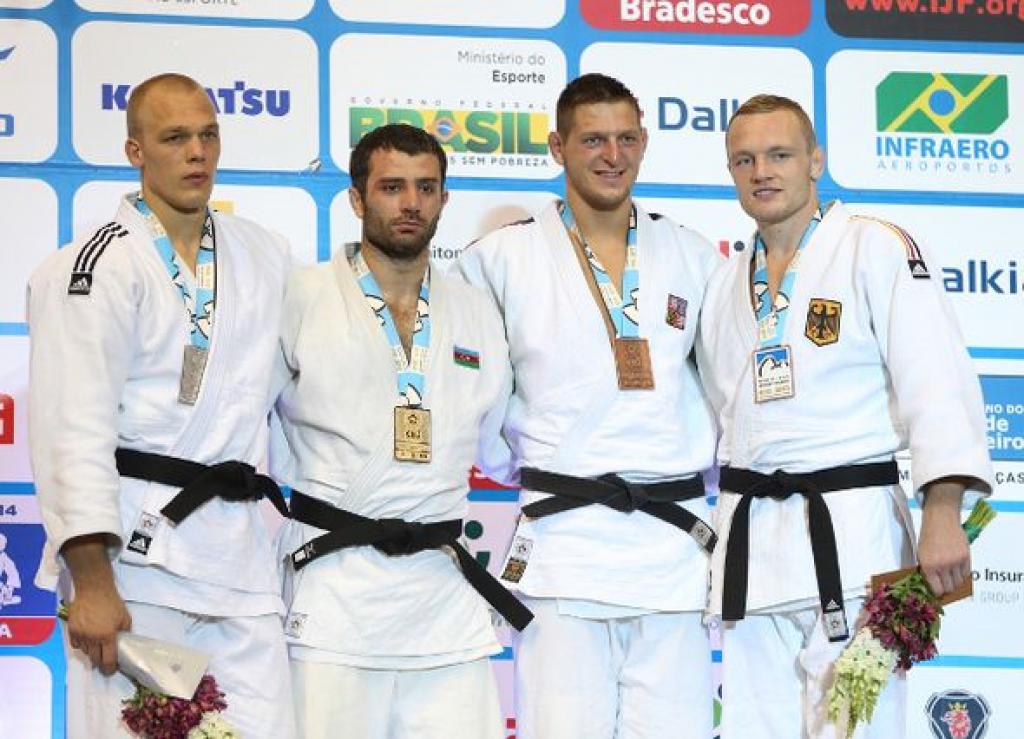 Riner and Mammadov claim World titles