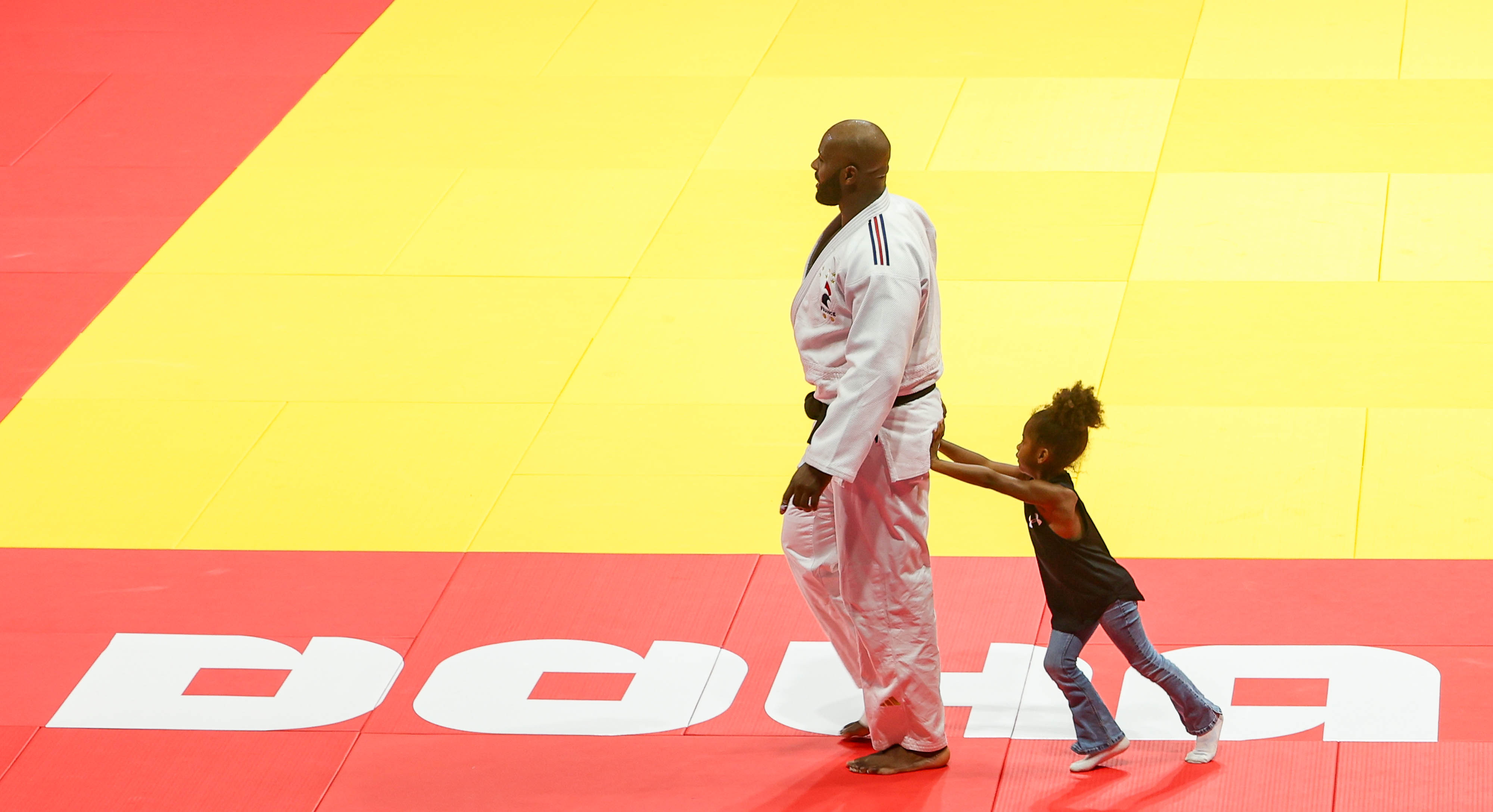 'Home time daddy!' Teddy RINER and his daughter in the Doha World Championships.